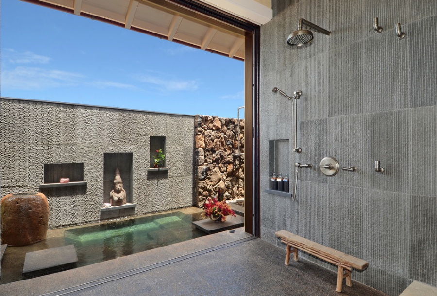 salle de bain pierre au sol comme aux murs