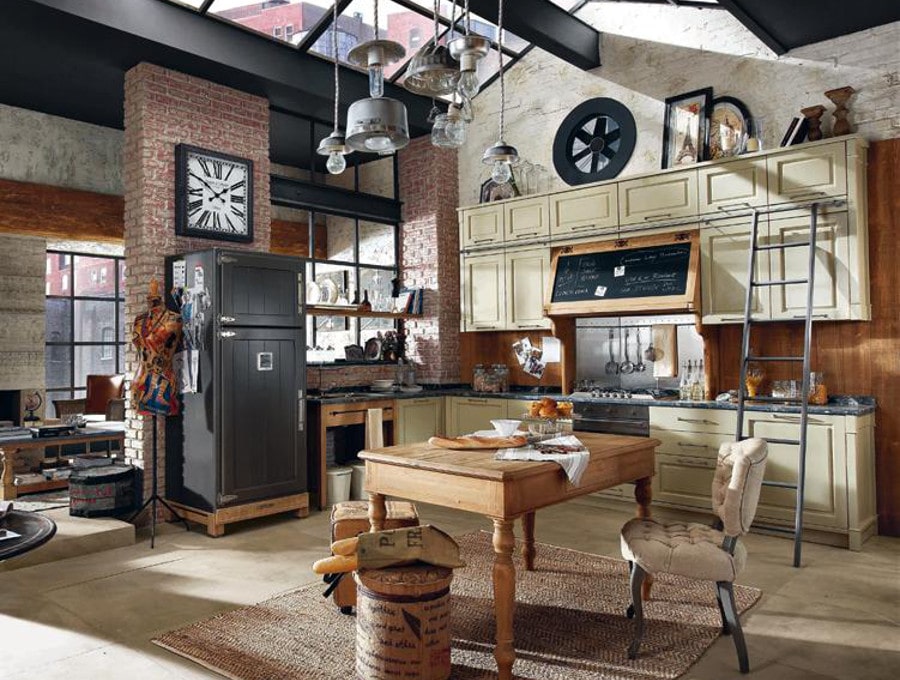 On aime déjà la cuisine vintage en soi mais ici le toit en verrière et l'aménagement style loft mettent la barre un peu plus haut.