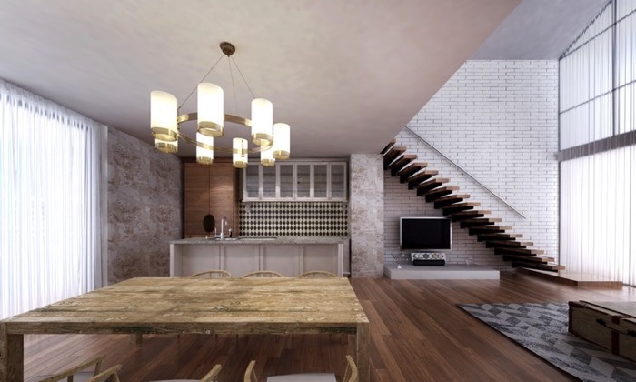 Idée déco salle à manger traditionnelle avec table en bois, cuisine avec plan de travail en L en arrière-plan. TV, barre de son, parquet, tapis gris sur le côté et escalier à droite.